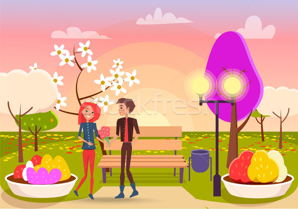 Młody chłopak bukiet kwiaty cute dziewczyna wiosną Zdjęcia stock © robuart