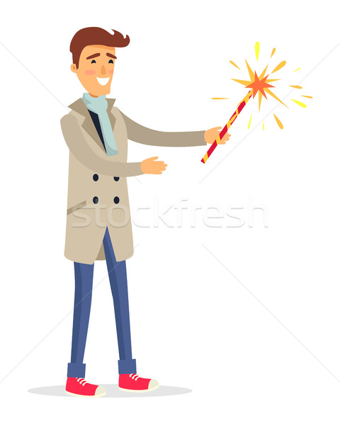 Isolated man in Beige Coat Holds Fireworks Device Stock photo © robuart