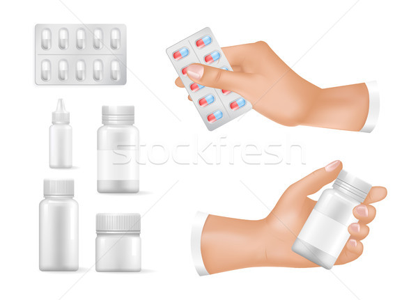 Empty Containers for Medicines in Human Hands Set Stock photo © robuart