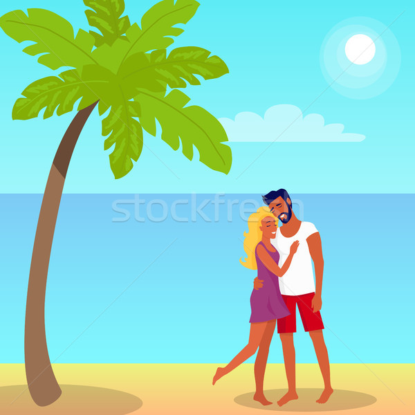 Couple Stands and Hugs on Beach in Palm Shade Stock photo © robuart
