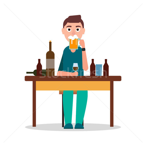 Man Sitting by Table with Lot of Alcohol Drinks Stock photo © robuart