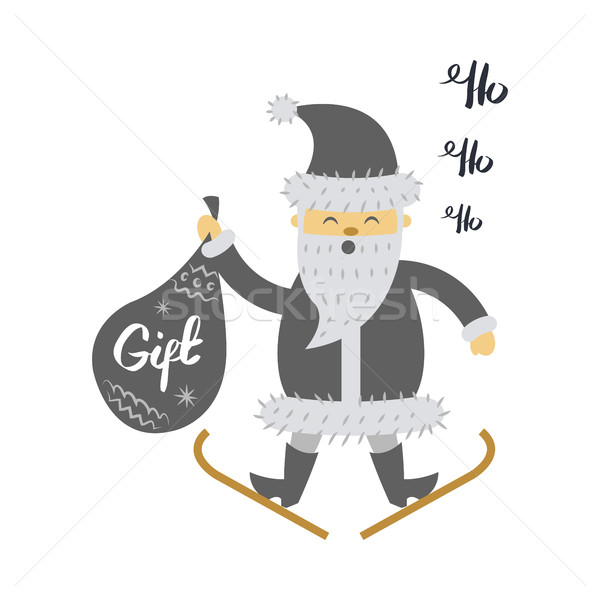 Santa Claus on Ski with Gift Bag Screaming Hohoho Stock photo © robuart