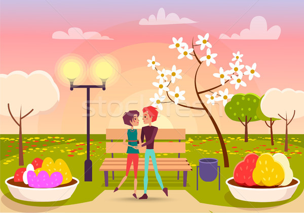 Couple Looks Eyes to Eyes in Park near Streetlight Stock photo © robuart