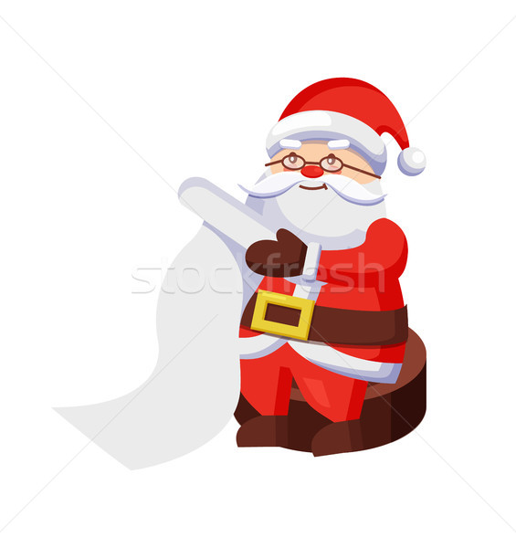 Santa Clauses with Wish List Sits on Wooden Stump Stock photo © robuart