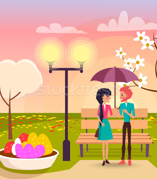 Couple under Umbrella in Park near Streetlight Stock photo © robuart