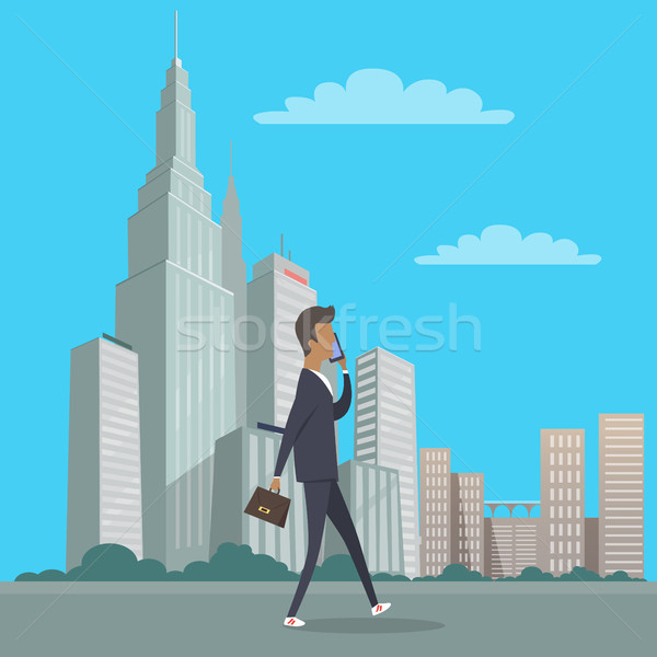Businessman with Bag in Hand Walking in City Centre Stock photo © robuart