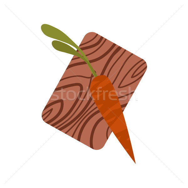 Stock photo: Dark Orange Carrot with Tops on Chopping Board