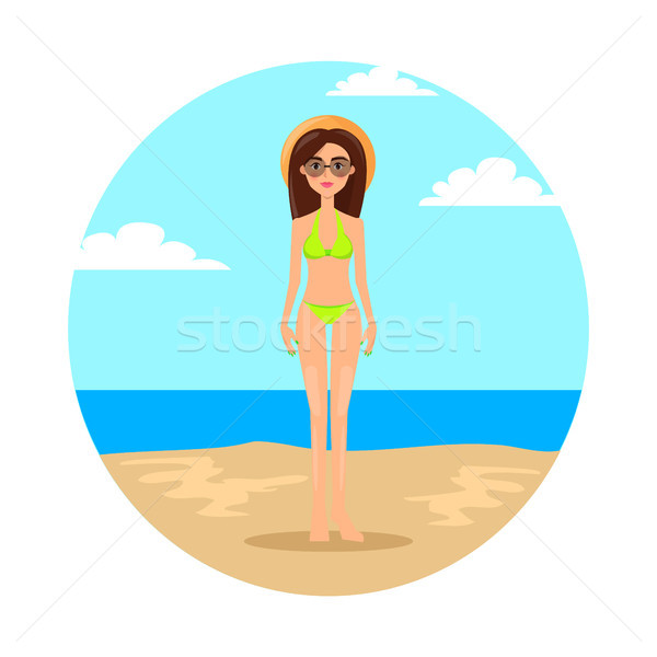 Dziewczyna zielone bikini słomkowy kapelusz plaży duży Zdjęcia stock © robuart