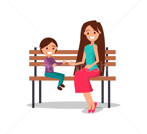 Smiling Mother and Son Sitting on Wooden Bench Stock photo © robuart