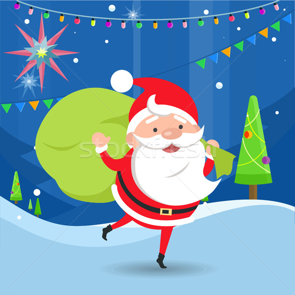 Santa Claus Waving and Holding Bag with Gifts Stock photo © robuart