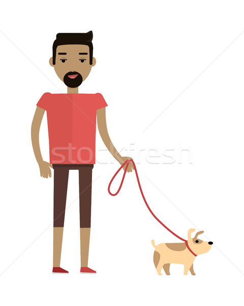 Young Man Walking His Dog Stock photo © robuart