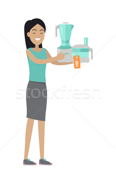 Stock photo: Woman Buys Food Processor on Sale at Low Price