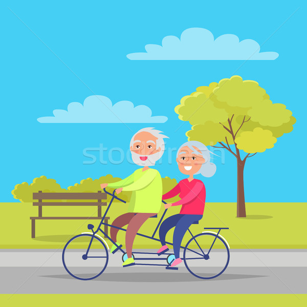 Gelukkig volwassen paar paardrijden samen fiets Stockfoto © robuart