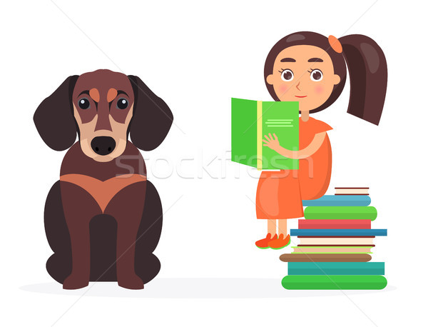 Pretty Schoolgirl Sits on Pile of Books with Pet Stock photo © robuart