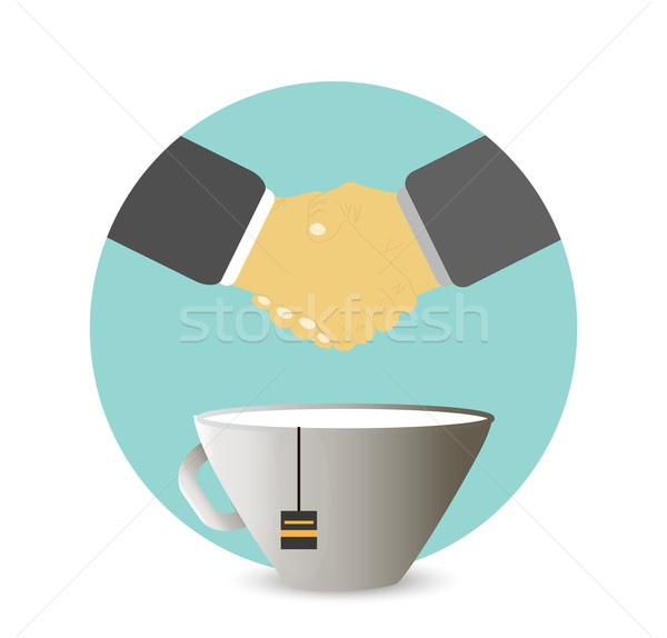 Handshake behind a cup of tea, coffee Stock photo © robuart