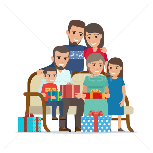Family Gathered Together Holding Present Boxes Stock photo © robuart