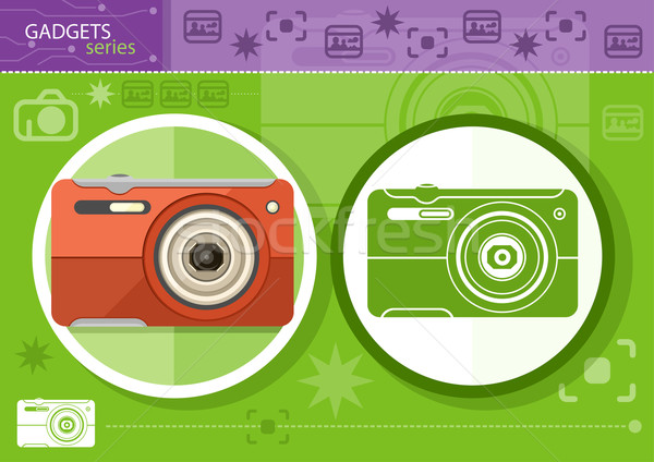Digital camera in frame on green background Stock photo © robuart