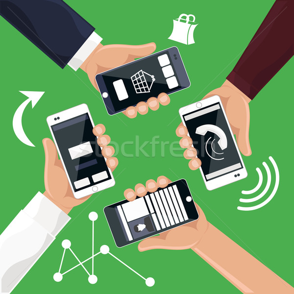 Hands holding smartphones telephones that Stock photo © robuart