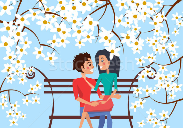 Couple Sit on Bench Surrounded with Cherry Blossom Stock photo © robuart