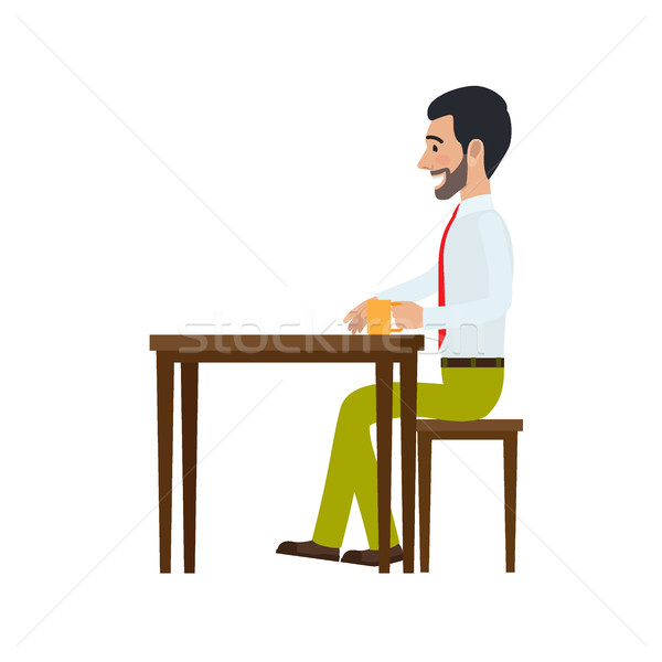 Man Sitting at Chair and Drinking Tea Side View Stock photo © robuart