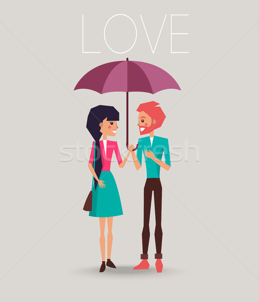 Young Couple in Love Standing under One Umbrella Stock photo © robuart