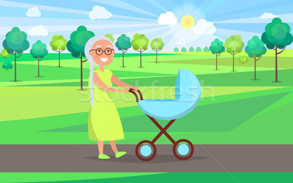 Stock photo: Senior Lady with Trolley Pram Walking in City Park