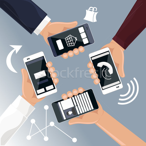 Hands holding smartphones telephones that Stock photo © robuart