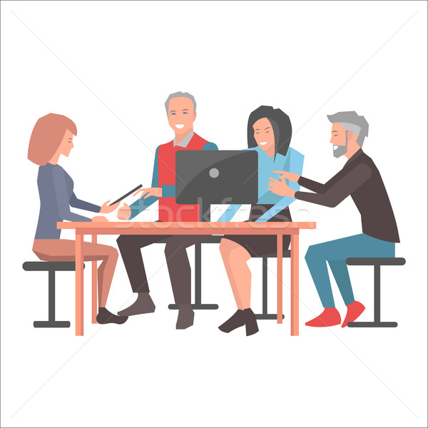 Smiling People Sitting at Table with Black Laptop Stock photo © robuart