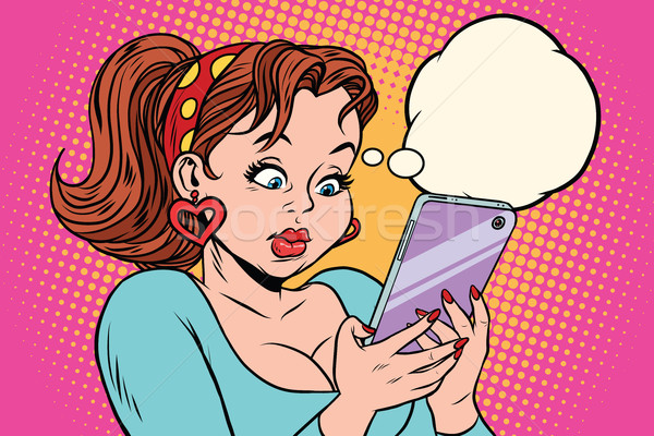 Młoda kobieta czytania wiadomość komórkowych komiks cartoon Zdjęcia stock © rogistok
