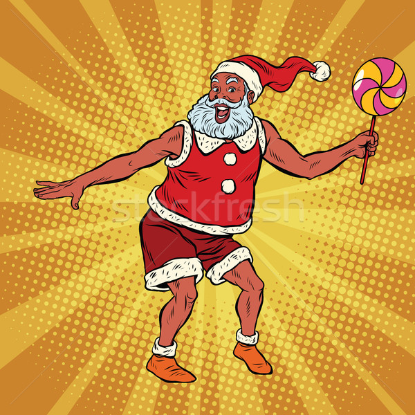 Southern Santa Claus dancing with lollipop Stock photo © rogistok