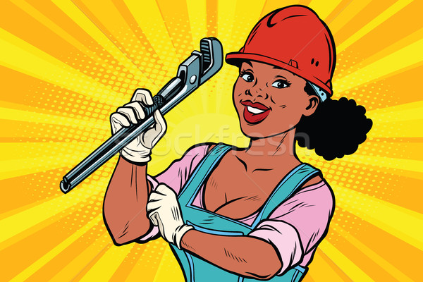 Travailleur de la construction clé à molette femme professionnels réparation outil Photo stock © rogistok