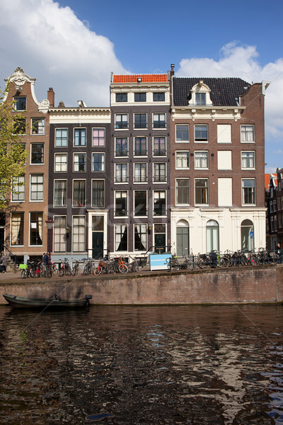 Canal maisons Amsterdam holland Pays-Bas eau Photo stock © rognar