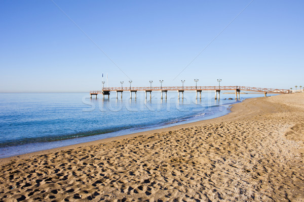 Beach Pier and Sea in Marbella Stock photo © rognar