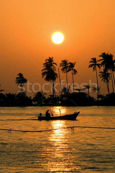 Pêcheur maison bang soleil coucher du soleil paysage Photo stock © rognar