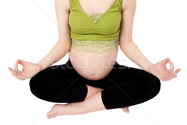 Mulher grávida ioga isolado branco bebê Foto stock © rognar