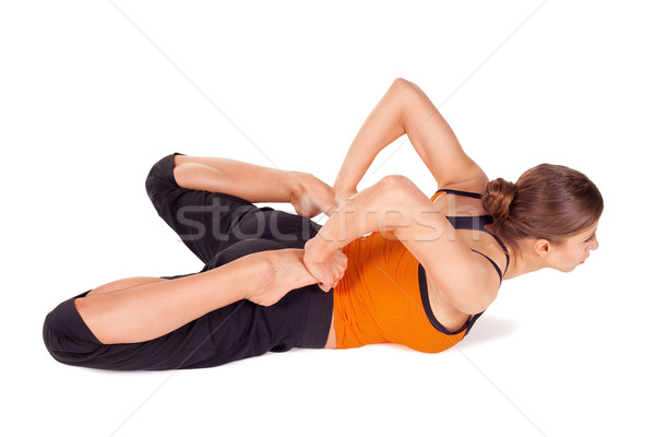 Woman Doing Frog Pose Yoga Exercise Stock photo © rognar