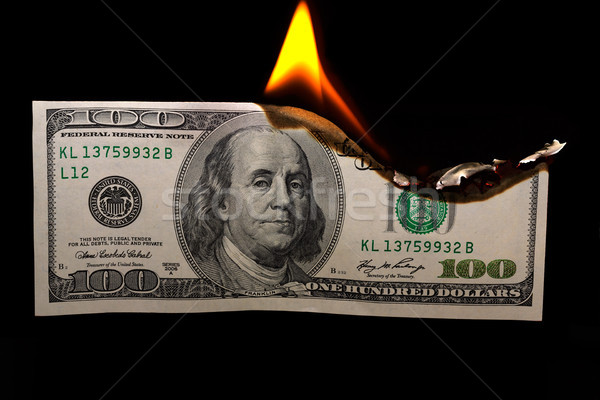 Burning dollars Stock photo © Roka