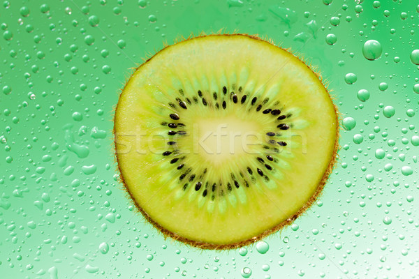 Slice of kiwi Stock photo © Roka