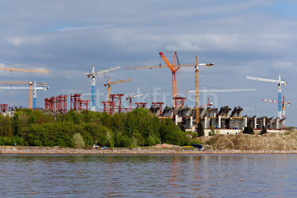 Cranes on a construction site. Stock photo © Roka