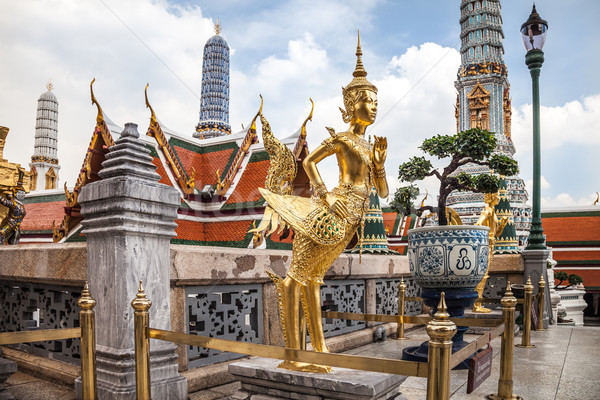 Golden Kinnara Statue in Grand Palace of Bangkok Stock photo © romitasromala