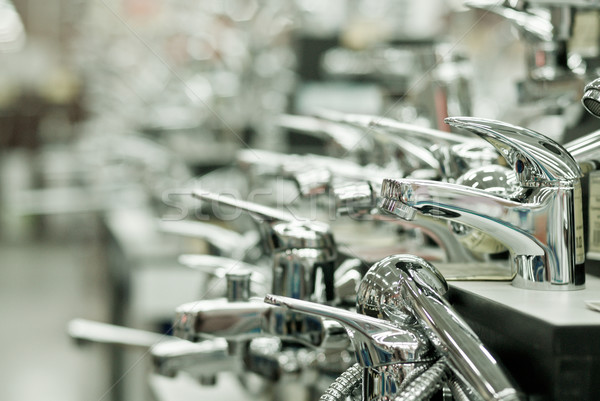 Row of water taps in building shop Stock photo © rosipro