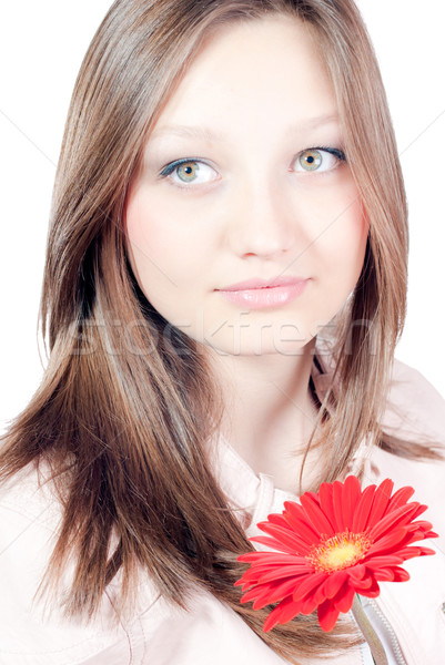 Beautiful young woman holding red flower Stock photo © rosipro