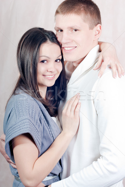 Happy young couple embracing Stock photo © rosipro