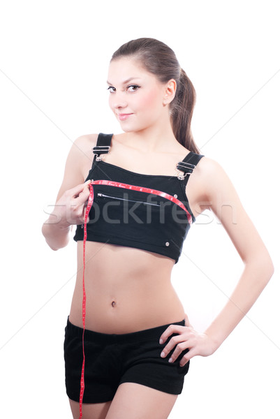 Young beautiful woman with measure tape Stock photo © rosipro