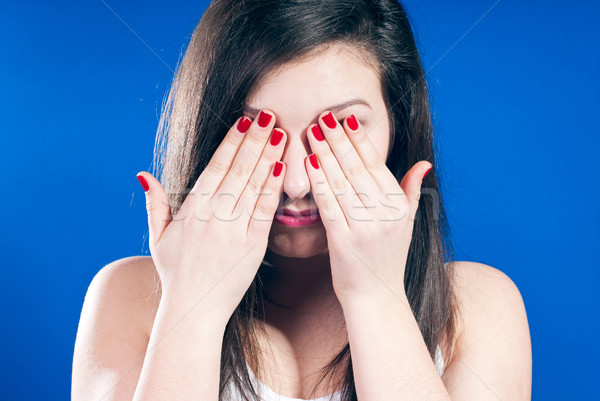 Ochi palmele albastru ecran femeie Imagine de stoc © rosipro