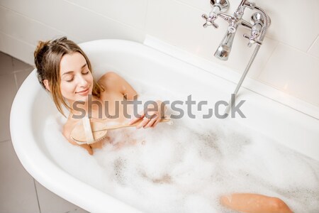Kobieta młoda kobieta kawy kąpieli Zdjęcia stock © RossHelen