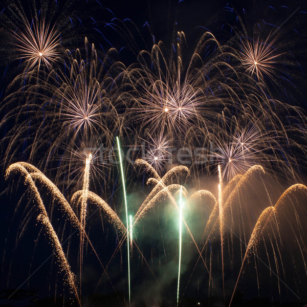 Colorful fireworks over dark sky Stock photo © rozbyshaka