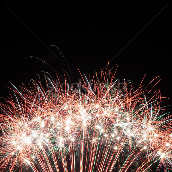 Colorful fireworks over dark sky Stock photo © rozbyshaka