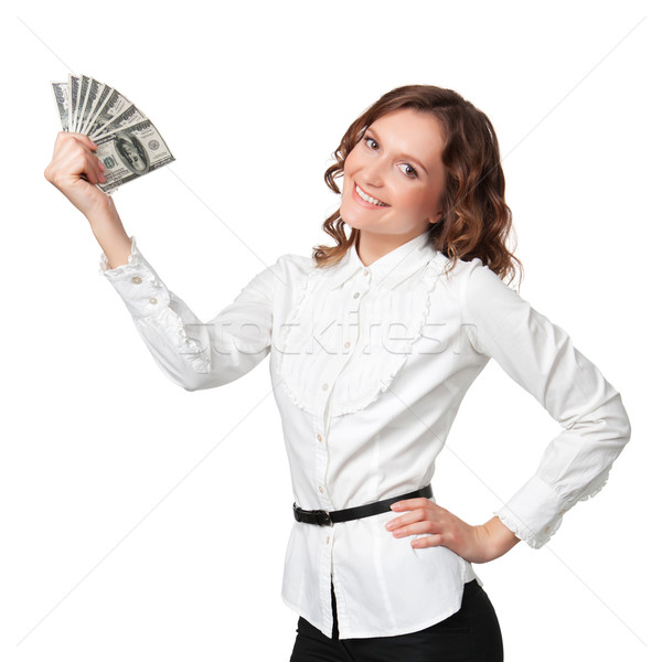 Portrait of pretty young woman holding a fan of dollar bills Stock photo © rozbyshaka