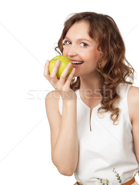 Portrait of fit young girl biting a fresh ripe apple  Stock photo © rozbyshaka